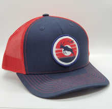 Antelope Donut Sunset Patch on a Navy Blue and Red Snapback Trucker Hat