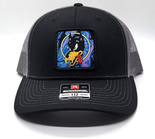 Wolf Psychedelic Drip Patch on a Black and Charcoal Richardson Trucker Hat