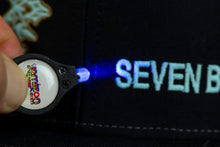 Ultra Violet LED Keychain Light on Seven Below Phish Hat